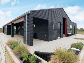 10 person holiday home in L kken